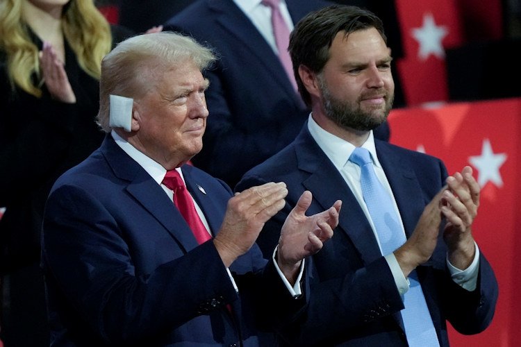 Republican presidential candidate former President Donald Trump and Republican vice presidential candidate Sen. JD Vance, R-Ohio, appear during the Republican National Convention Monday evening in Milwaukee.
