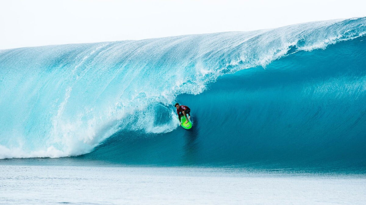 Griffin Colapinto rides through the barrel of a wave