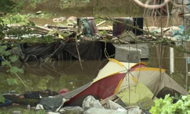 Flash flooding left dozens of homeless individuals in displaced after waking up to their belongings and encampments overrun by rushing water.