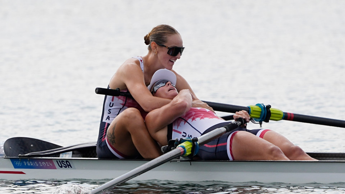 Azja Czajkowski and Jess Thoennes react after the women's pair semifinal rowing race during the Paris Olympic Games at Vaires-sur-Marne Nautical Stadium.