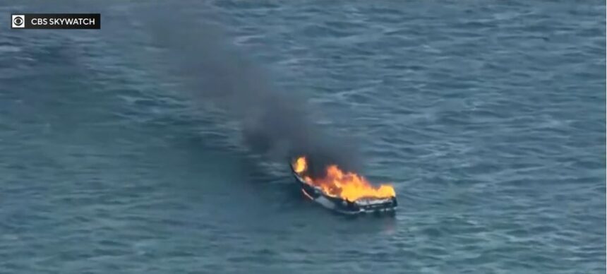 Woman rescued two men after boat explosion on Lake Michigan. 