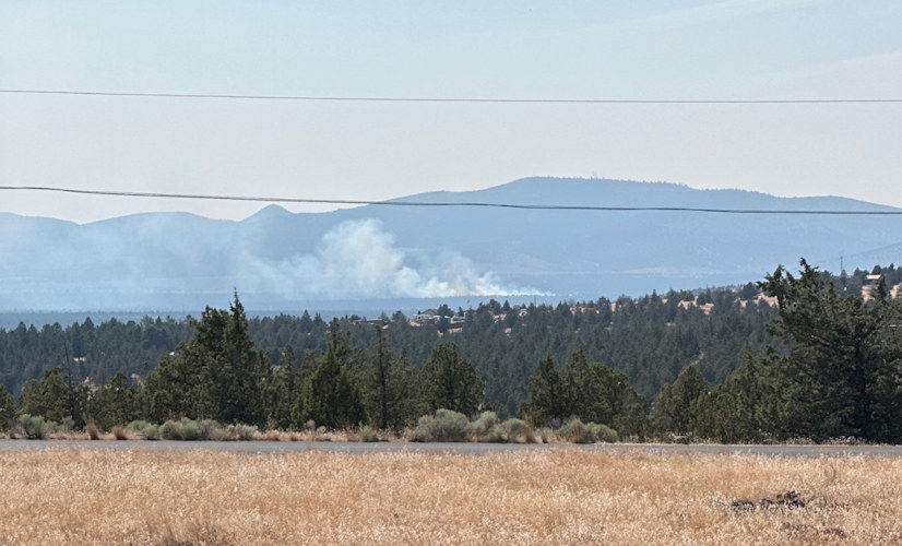Fire off Millican Road SW of Prineville Saturday afternoon was visible from a distance.