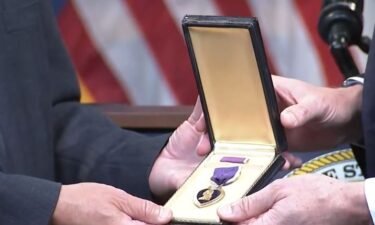 The Illinois State Treasurer returned a Purple Heart medal to the son of a man who was a World War II veteran who was a master sergeant serving in the Army Air Corps.