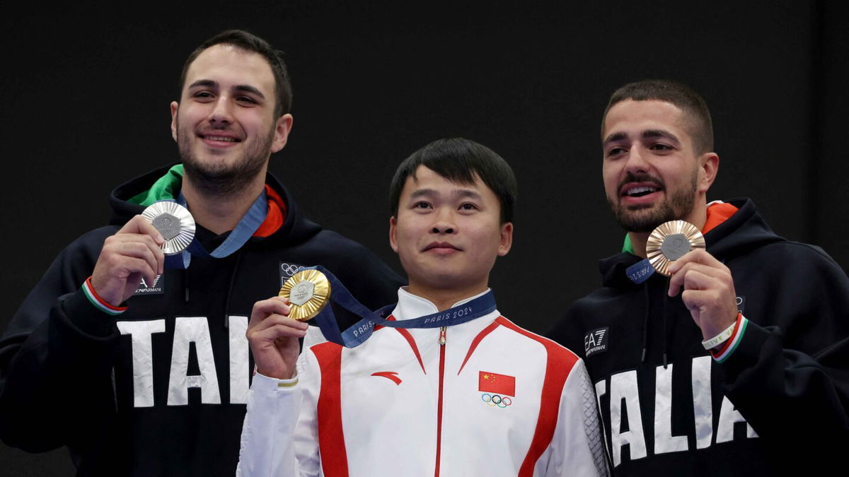 China wins second shooting gold as Xie Yu takes men's 10m air pistol ...