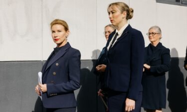 Kaechele (left) and her navy-clad entourage outside the tribunal earlier this year.