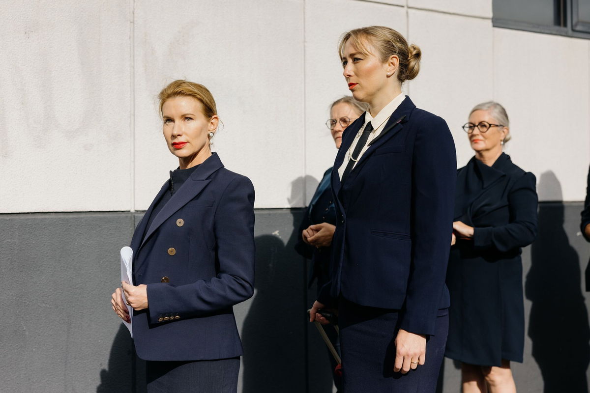 <i>Charlotte Vignau via CNN Newsource</i><br/>Kaechele (left) and her navy-clad entourage outside the tribunal earlier this year.