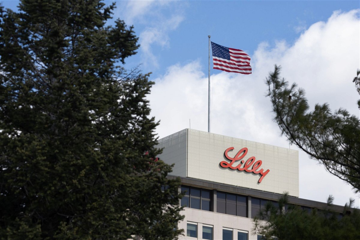 <i>Scott Olson/Getty Images via CNN Newsource</i><br/>A flag flies above the headquarters campus of Eli Lilly and Company on March 17
