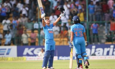 Harmanpreet Kaur of India celebrates after scoring a century during game two of the ODI series between India and South Africa at M. Chinnaswamy Stadium on June 19 in Bengaluru