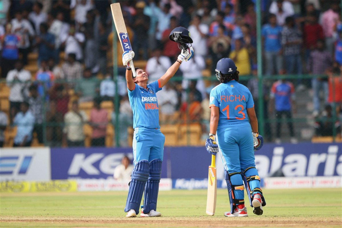 <i>Abhishek Chinnappa/Getty Images via CNN Newsource</i><br/>Harmanpreet Kaur of India celebrates after scoring a century during game two of the ODI series between India and South Africa at M. Chinnaswamy Stadium on June 19 in Bengaluru