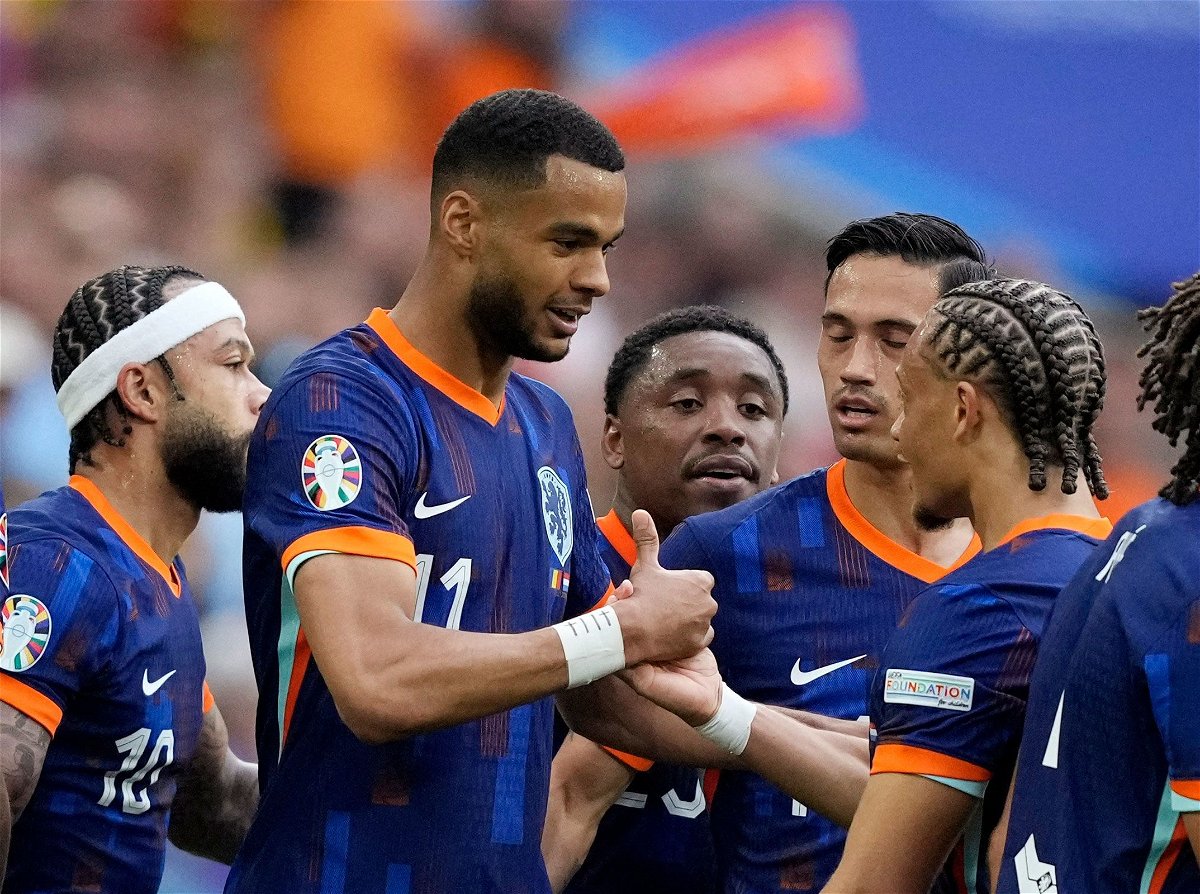 <i>Fiona Noever/Reuters via CNN Newsource</i><br/>Cody Gakpo celebrates with his teammates after scoring the Netherlands' first goal against Romania.