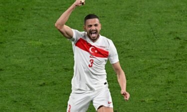 Merih Demiral celebrates after his second goal against Austria.
