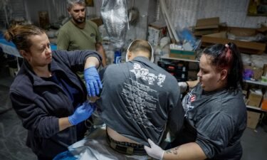 Medics prepare for transportation of a wounded Ukrainian serviceman inside a medical stabilization point near Chasiv Yar on July 1.