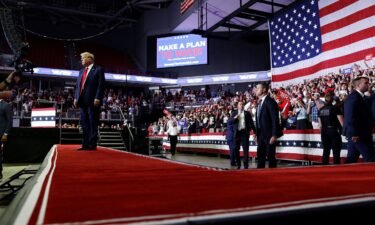 Former President Donald Trump walks offstage after speaking at a campaign rally at the Liacouras Center on June 22