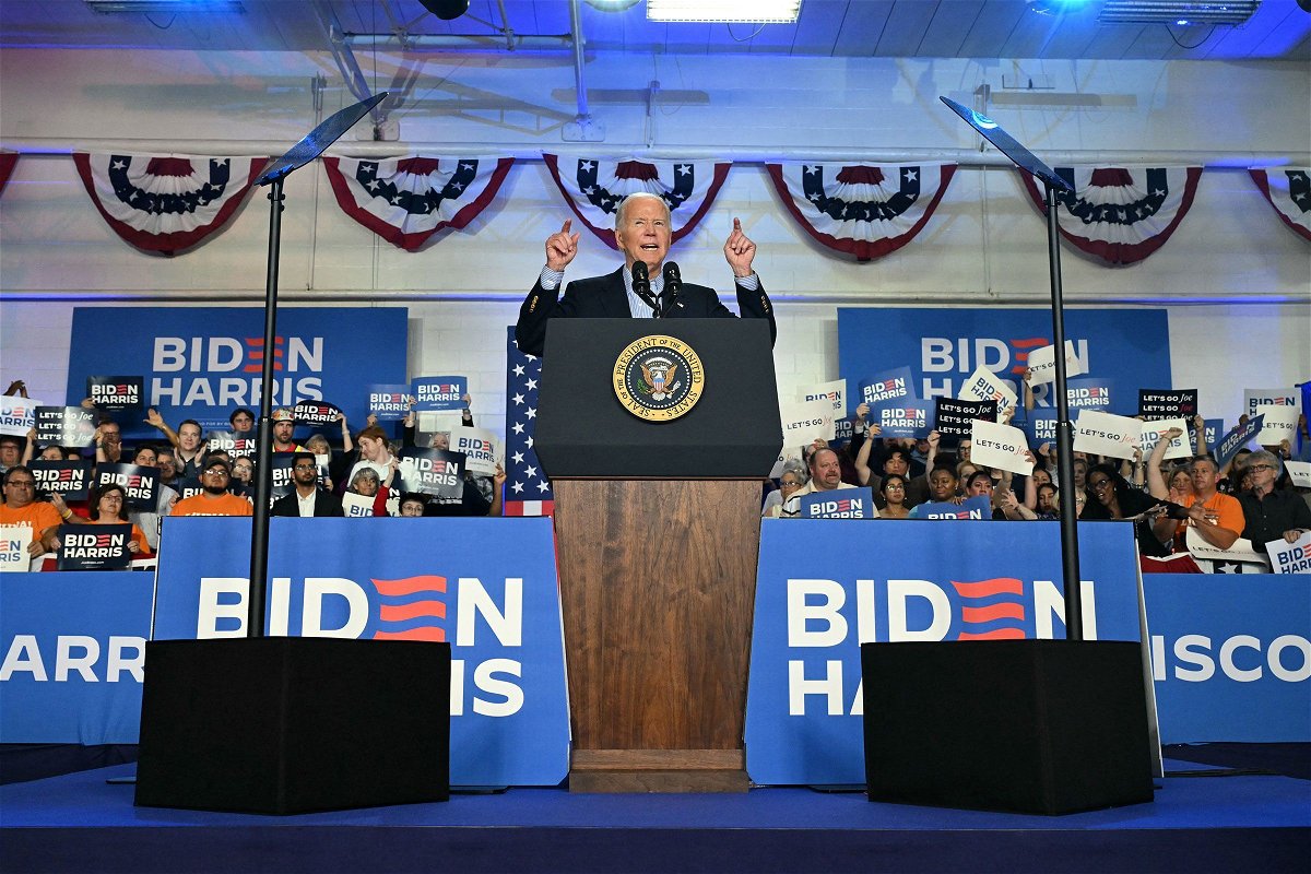 <i>Saul Loeb/AFP/Getty Images via CNN Newsource</i><br/>President Joe Biden speaks during a campaign event in Madison