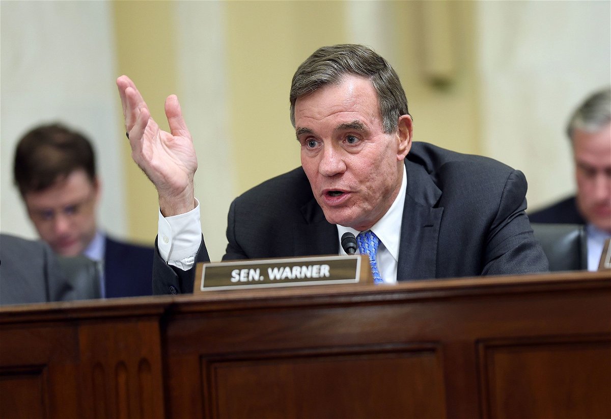 <i>Kevin Dietsch/Getty Images/File via CNN Newsource</i><br/>Sen. Mark Warner delivers remarks during a Rules Committee hearing at the Russell Senate Office Building in November 2023 in Washington