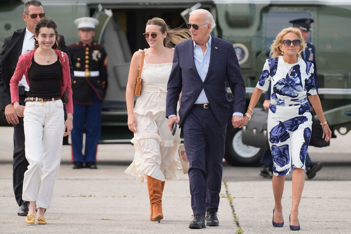 <i>Evan Vucci/AP via CNN Newsource</i><br/>President Joe Biden and first lady Jill Biden and their granddaughters Natalie Biden