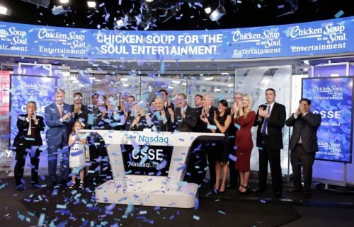 Chicken Soup for the Soul Entertainment executives ring the opening bell at the Nasdaq in 2017. The parent company of Redbox has filed for bankruptcy after enduring months of financial struggle.