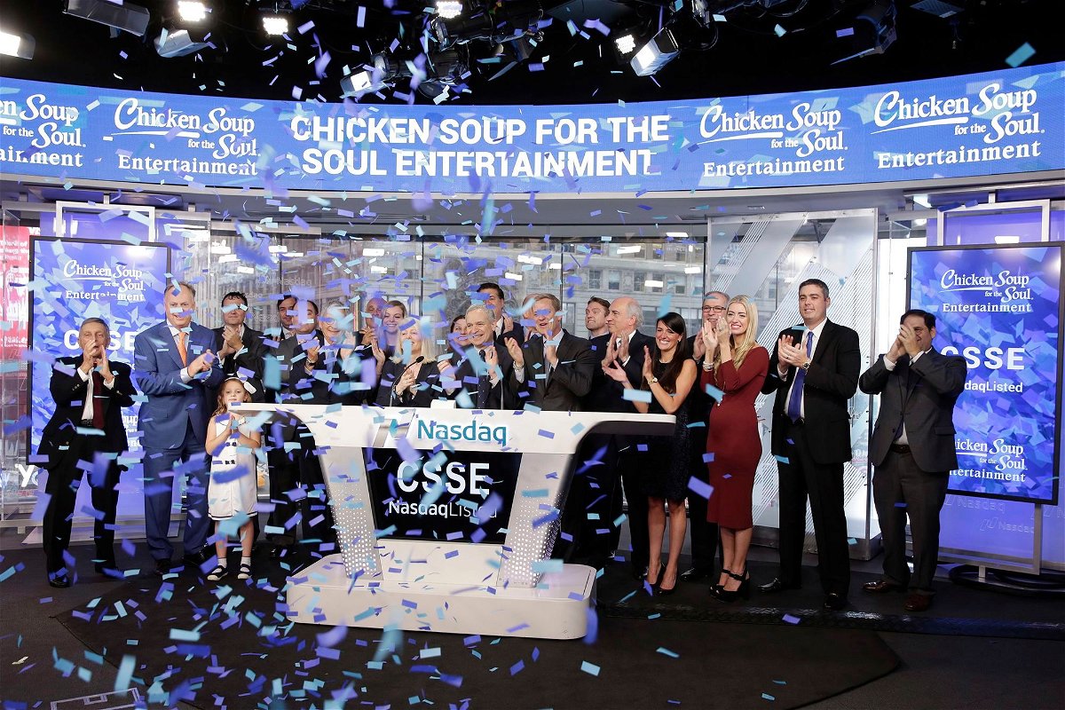 <i>Richard Drew/AP via CNN Newsource</i><br/>Chicken Soup for the Soul Entertainment executives ring the opening bell at the Nasdaq in 2017. The parent company of Redbox has filed for bankruptcy after enduring months of financial struggle.