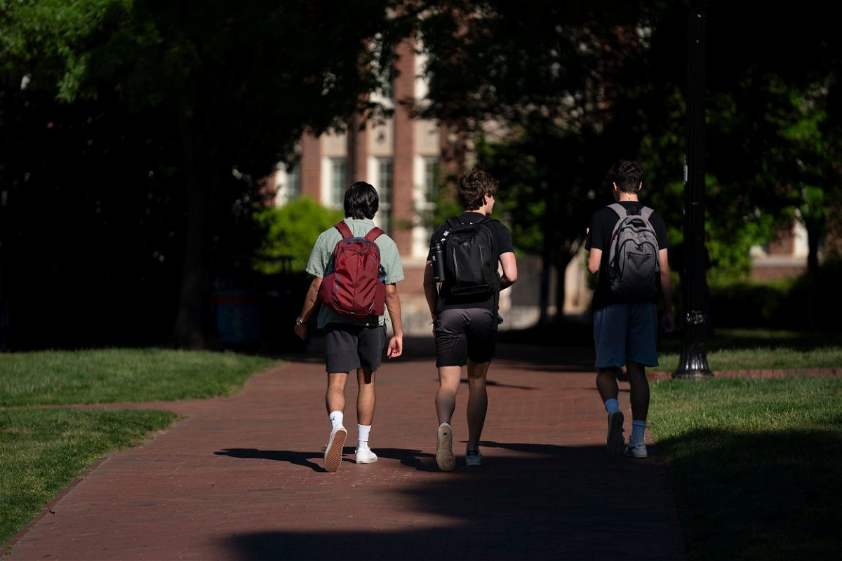 <i>Sean Rayford/Getty Images via CNN Newsource</i><br/>Students walk on campus at the University of North Carolina on May 1