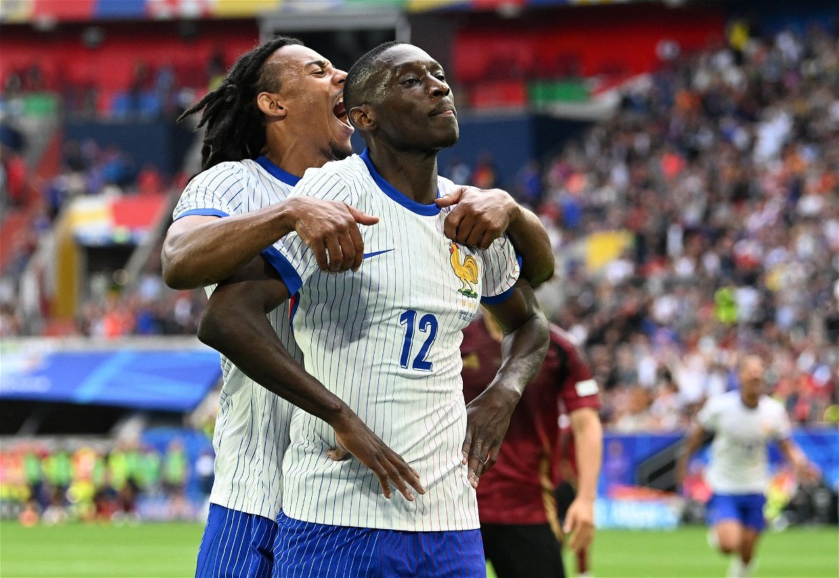 <i>Carmen Jaspersen/Reuters via CNN Newsource</i><br/>France's Randal Kolo Muani celebrates with teammates after scoring the only goal of the game against Belgium.