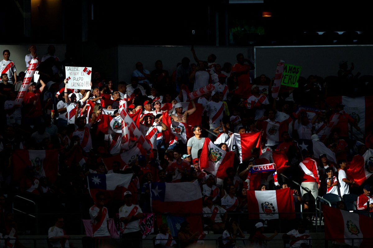 <i>Aric Becker/AFP/Getty Images via CNN Newsource</i><br/>Peru's supporters cheer during a match between Peru and Chile at AT&T Stadium in Arlington