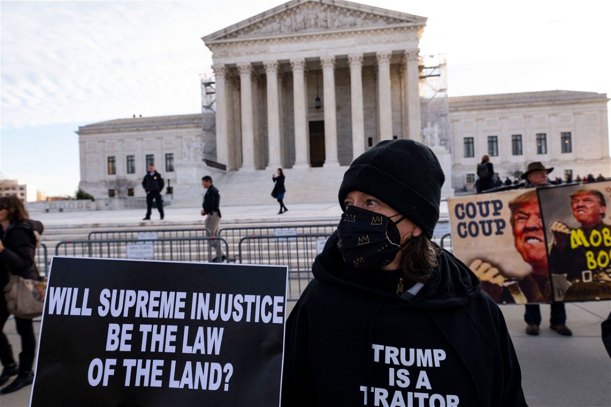 <i>Roberto Schmidt/AFP via Getty Images via CNN Newsource</i><br/>Anti-Trump demonstrators protest outside the US Supreme Court as the court considers whether former US President Donald Trump is eligible to run for president in the 2024 election in Washington