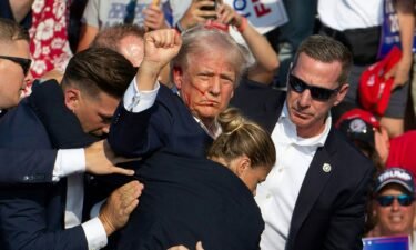 Former President Donald Trump is escorted offstage by Secret Service agents after a gunman opens fire at him at a Pennsylvania rally last weekend.