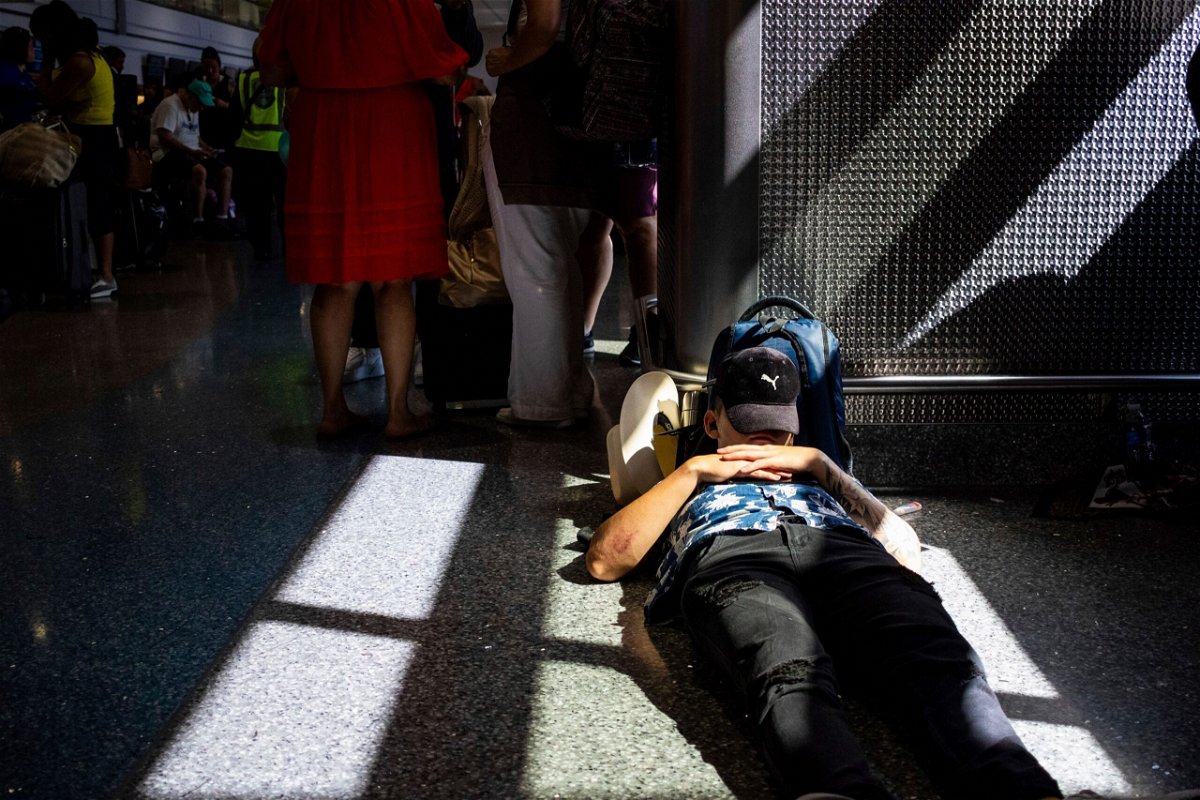 <i>Ty ONeil/AP via CNN Newsource</i><br/>A passenger takes a nap inside a terminal at Harry Reid International Airport on July 19