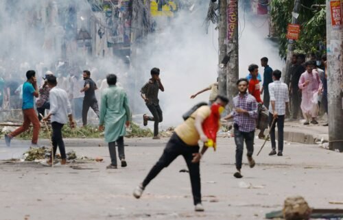 Anti-quota protesters clash with Border Guard Bangladesh and the police outside the state-owned Bangladesh Television in Dhaka