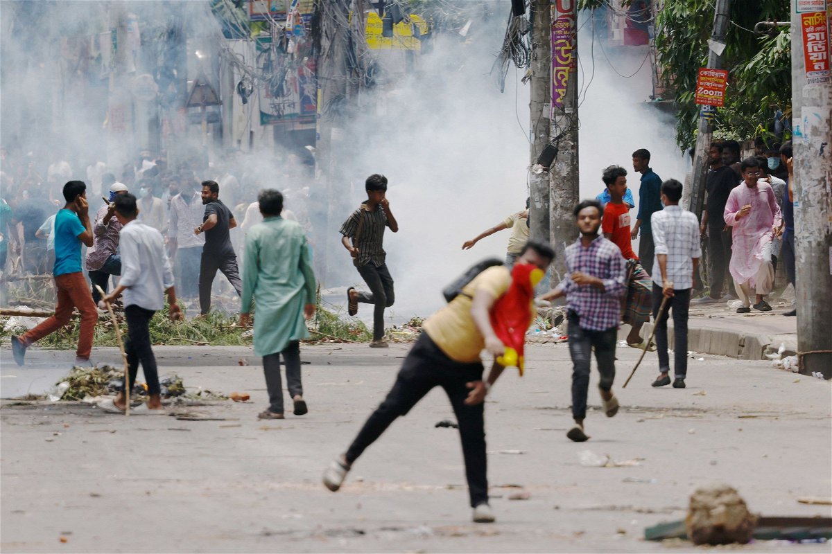 <i>Mohammad Ponir Hossain/Reuters via CNN Newsource</i><br/>Anti-quota protesters clash with Border Guard Bangladesh and the police outside the state-owned Bangladesh Television in Dhaka