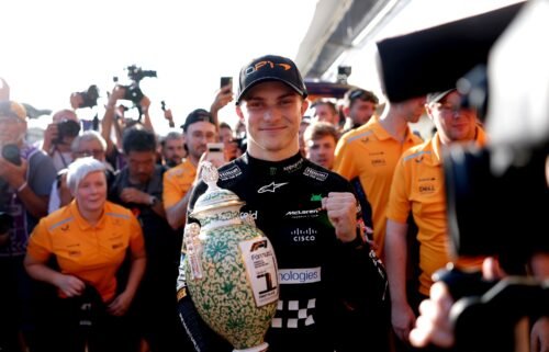 Oscar Piastri celebrates his first F1 Grand Prix victory.