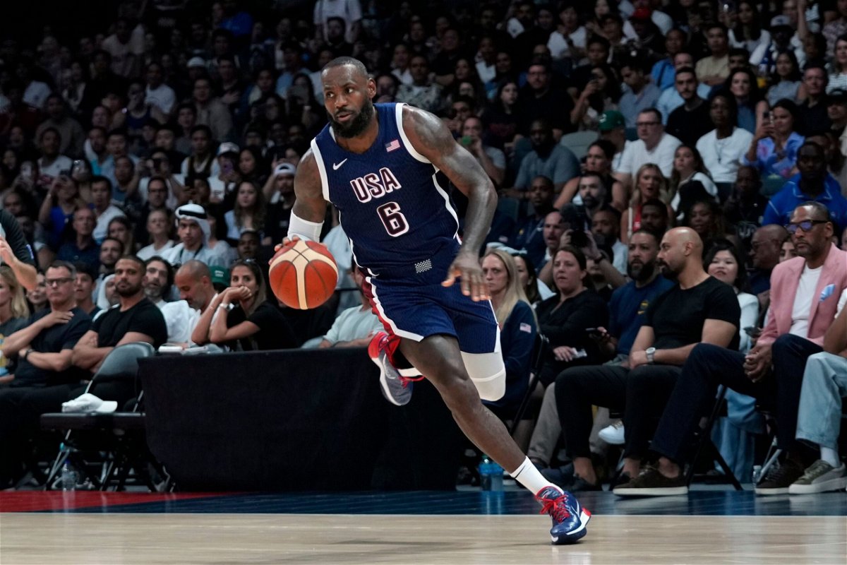 <i>Altaf Qadri/AP via CNN Newsource</i><br/>LeBron James is the first male basketball player to receive this distinction -  as Team USA’s male flag bearer for the Opening Ceremony of the Paris Olympic Games.