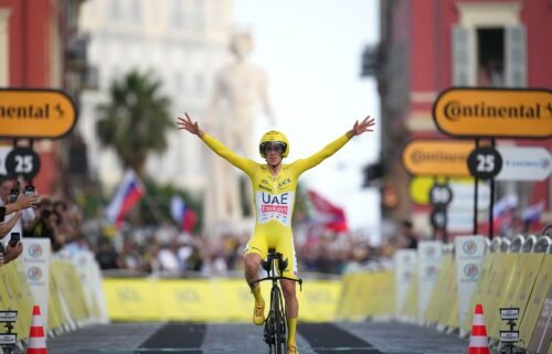 Pogačar crosses the finish line of Sunday's time trial in Nice