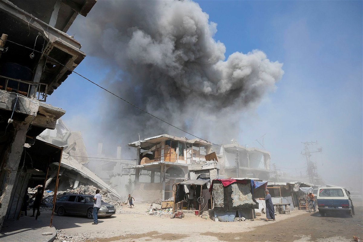 <i>Abdel Kareem Hana/AP via CNN Newsource</i><br/>Smoke rises following Israeli bombardments in Khan Younis