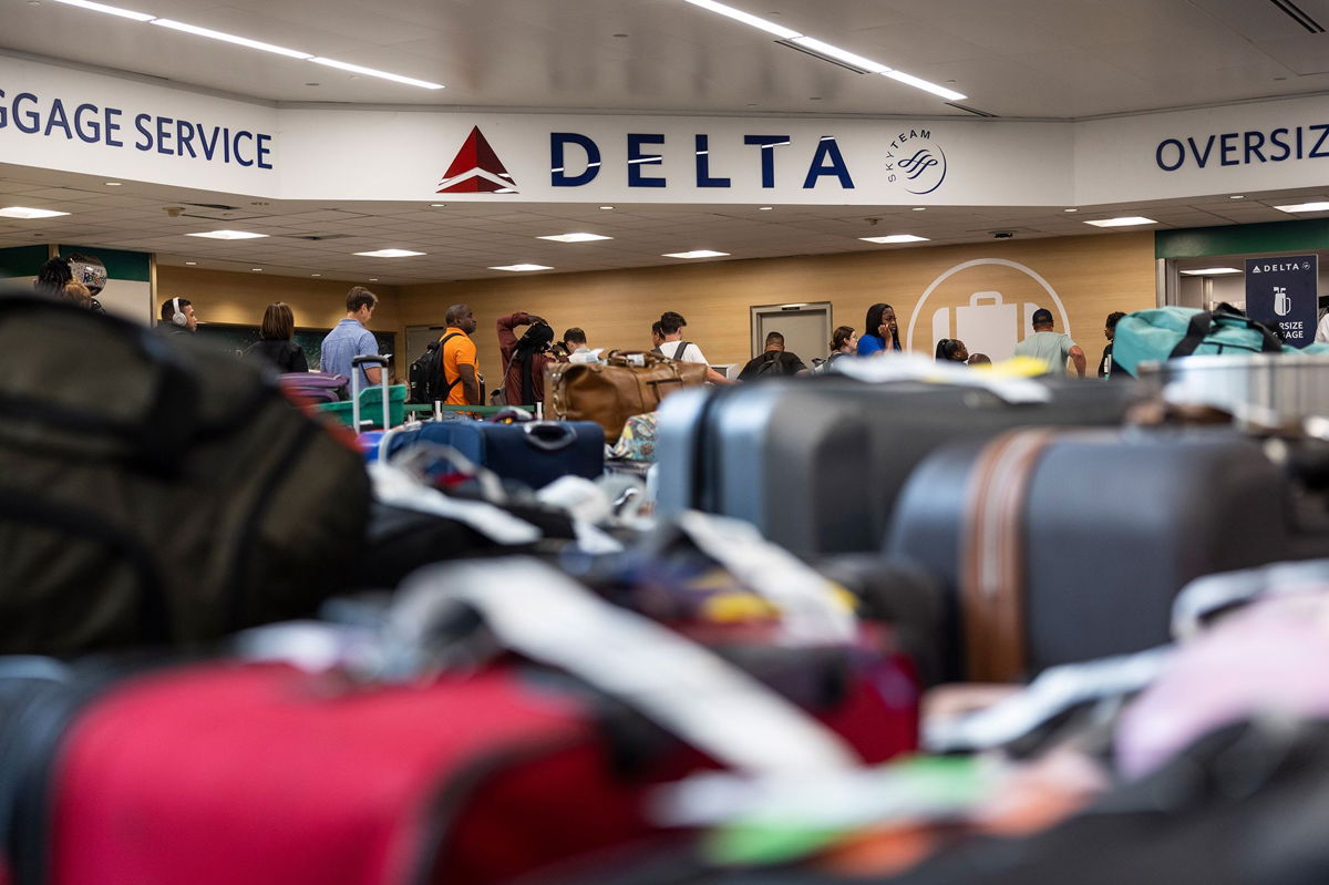 <i>Christian Monterrosa/Bloomberg/Getty Images via CNN Newsource</i><br/>Luggage at the Delta baggage claim at Hartsfield-Jackson Atlanta International Airport on July 23.