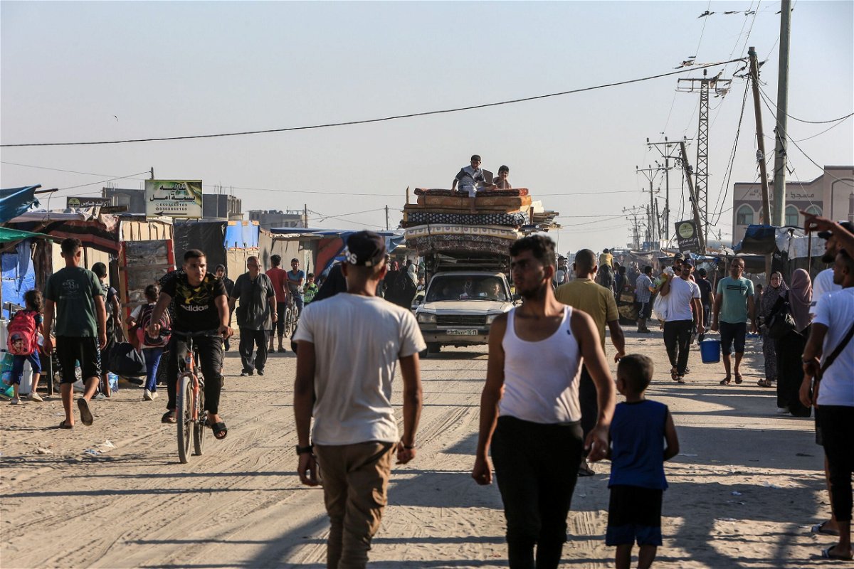 <i>Abed Rahim Khatib/Anadolu Agency/Getty Images via CNN Newsource</i><br/>Palestinians back their belongings and flee after Israeli strikes on Rafah in Gaza