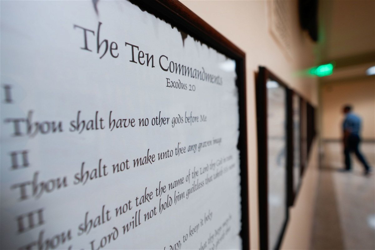<i>John Bazemore/AP/File via CNN Newsource</i><br/>A copy of the Ten Commandments is posted along with other historical documents in a hallway of the Georgia Capitol on June 20