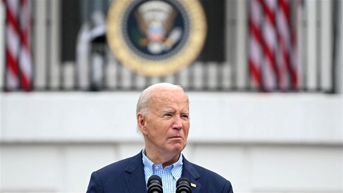 <i>Mandel Ngan/AFP/Getty Images via CNN Newsource</i><br/>President Joe Biden looks on as he speaks during a July 4 BBQ for active-duty military families on the South Lawn of the White House in Washington