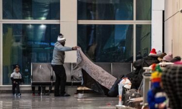 This file photo from January shows migrants families using Terminal E at Boston Logan International Airport as a shelter.