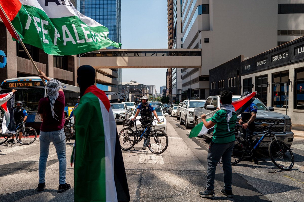 <i>Brandon Bell/Getty Images via CNN Newsource</i><br/>Law enforcement blocks an intersection as pro-Palestinian demonstrators protest the ongoing war with Israel in Gaza on the annual remembrance of Nakba near the Texas state Capitol on May 19 in Austin