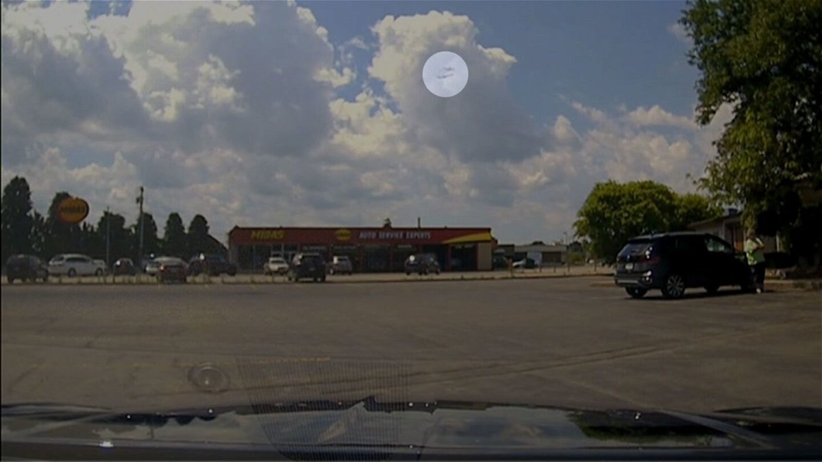 <i>North Syracuse Police Dept via CNN Newsource</i><br/>An image taken from a video shows two planes appearing to fly close to each other near Syracuse Hancock International Airport on July 8. CNN highlighted a portion of this image for emphasis.