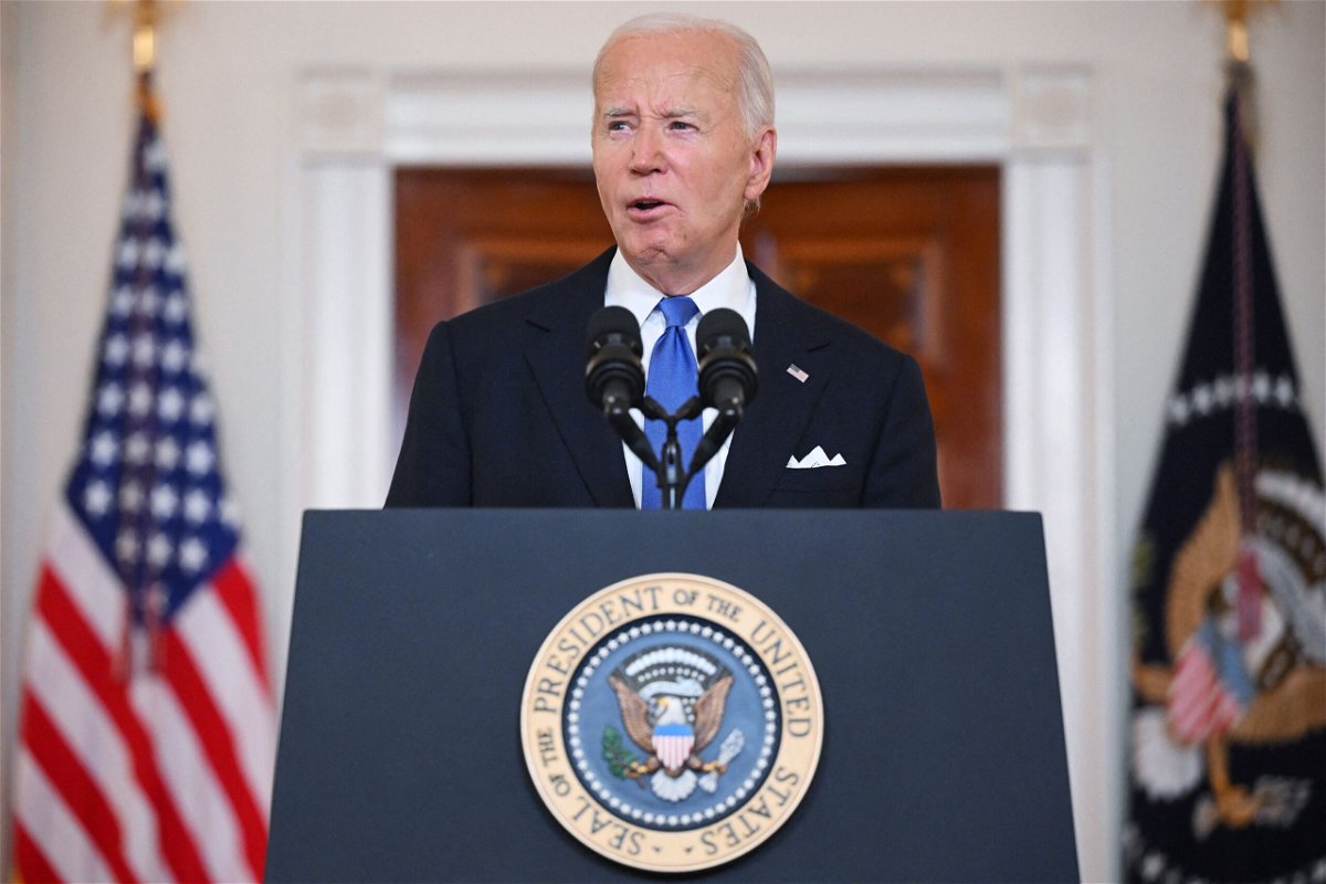 <i>Mandel Ngan/AFP/Getty Images via CNN Newsource</i><br/>US President Joe Biden delivers remarks on the Supreme Court's immunity ruling at the Cross Hall of the White House in Washington