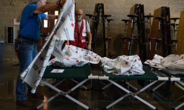 American Red Cross workers prepare cots in Houston