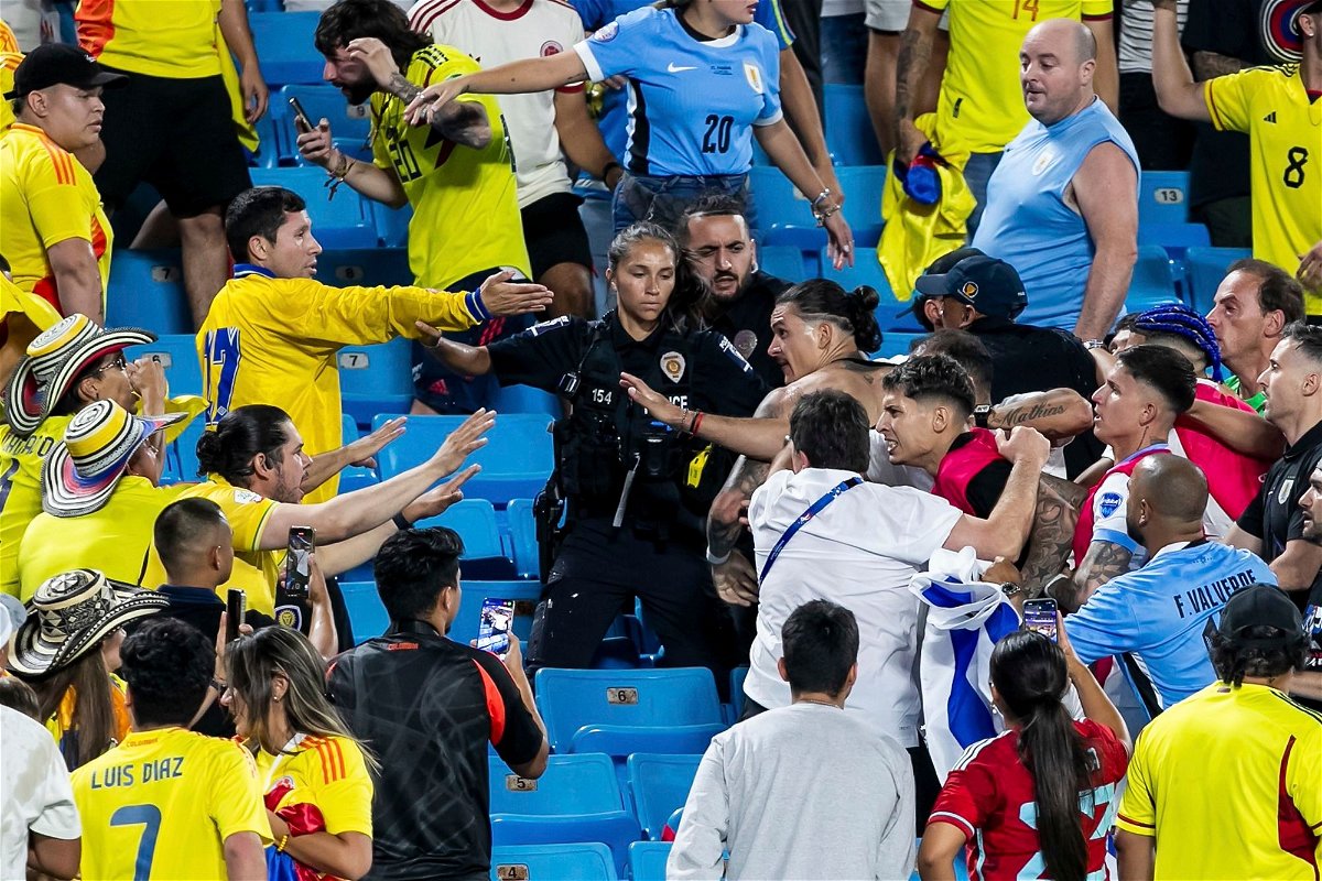 <i>Nick Tre. Smith/Icon Sportswire/AP via CNN Newsource</i><br/>Uruguay forward Darwin Núñez clashes with Colombia fans after the semifinal.