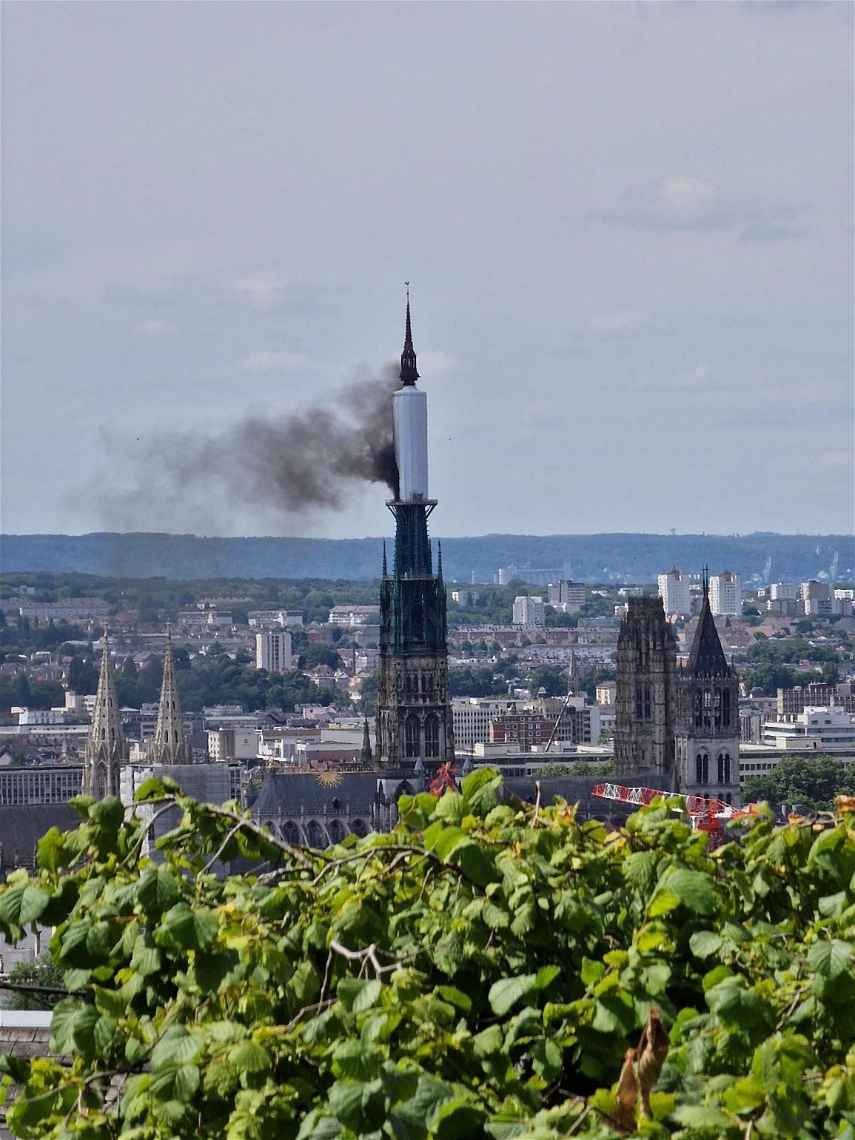 <i>Patrick Streiff/AFP/Getty Images via CNN Newsource</i><br/>Smoke billows from the spire of Rouen Cathedral in Rouen