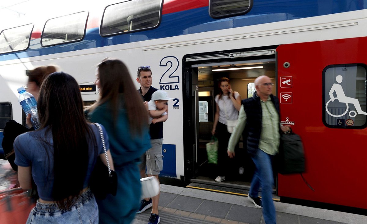<i>Li Ying/Xinhua/Getty Images via CNN Newsource</i><br/>Passengers get off the train at Novi Sad railway station in Novi Sad
