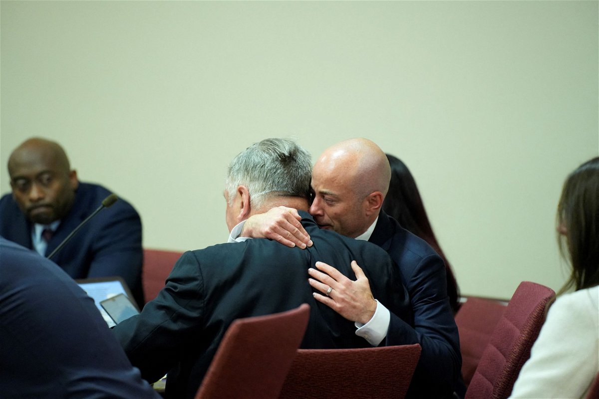 <i>Ramsay de Give/Pool/AFP/Getty Images via CNN Newsource</i><br/>Attorney Luke Nikas embraces actor Alec Baldwin during his trial on involuntary manslaughter at Santa Fe County District Court in Santa Fe