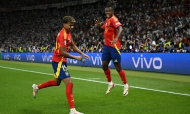 Nico Williams (right) celebrates with his teammate Lamine Yamal after scoring Spain's first goal against England in the Euro 2024 final.