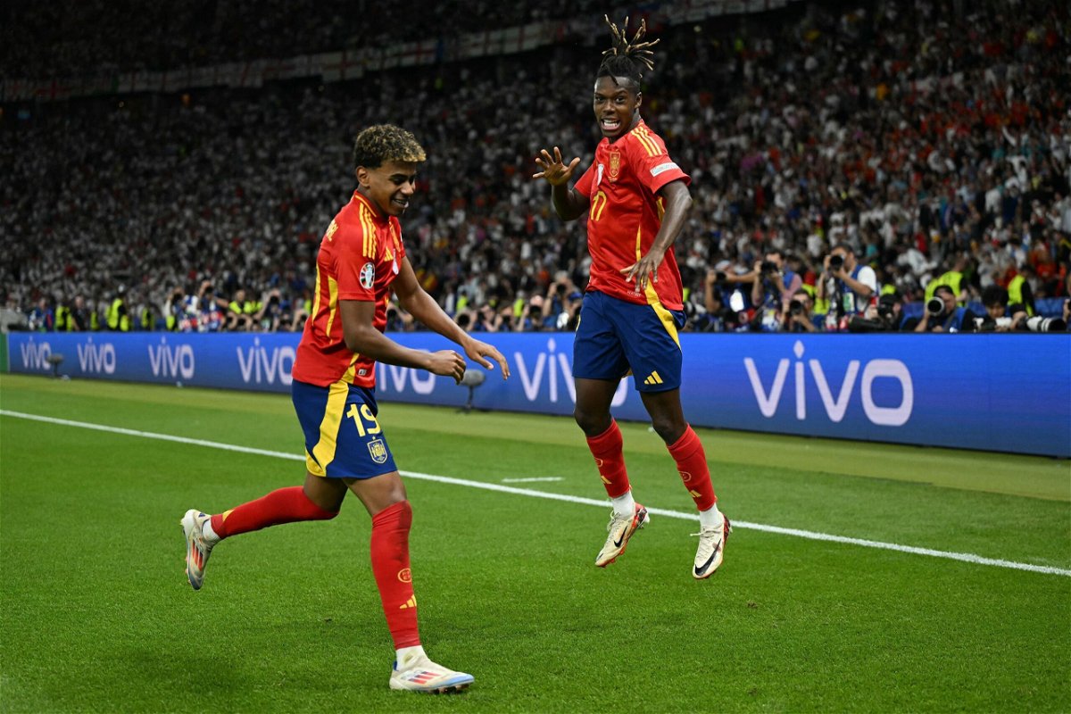<i>Ina Fassbender/AFP/Getty Images via CNN Newsource</i><br/>Nico Williams (right) celebrates with his teammate Lamine Yamal after scoring Spain's first goal against England in the Euro 2024 final.