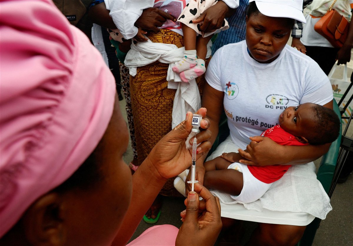 <i>Luc Gnago/Reuters via CNN Newsource</i><br/>A health employee prepares to give a malaria injection to a child during the official ceremony for the launch of a malaria vaccination campaign in Ivory Coast.